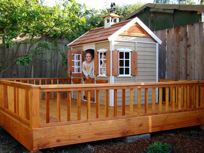 Created deck with railing for play house