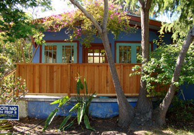 Replaced metal front porch railing with wood railing